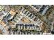This aerial view shows how the houses are lined along the main street and inside the neighborhood at 475 Rowes Cir, Alpharetta, GA 30009
