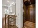 An interior elevator with wood finishes connects different levels in this home at 475 Rowes Cir, Alpharetta, GA 30009