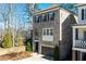 Elegant two-story brick home featuring a private garage and an charming arched balcony at 475 Rowes Cir, Alpharetta, GA 30009