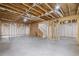 Unfinished basement with wood framework, stairs, and a concrete floor ready for customization at 331 Terrell Sw Dr, Marietta, GA 30064