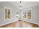 Empty bedroom with hardwood floors, large windows offering natural light and trimwork at 331 Terrell Sw Dr, Marietta, GA 30064