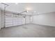 Spacious garage with an open layout and a large overhead door with windows at 331 Terrell Sw Dr, Marietta, GA 30064