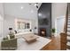 Bright living room with fireplace, vaulted ceiling, modern furniture and large window at 331 Terrell Sw Dr, Marietta, GA 30064