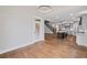 Living room featuring hardwood floors and open access to the kitchen and staircase at 331 Terrell Sw Dr, Marietta, GA 30064