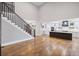Bright, open concept living room with hardwood floors and staircase leading to the second floor at 331 Terrell Sw Dr, Marietta, GA 30064