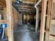This unfinished basement shows exposed utilities and framing for future expansion at 770 Prickett Rd, Douglasville, GA 30134