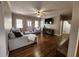 Spacious living room with fireplace, hardwood floors, and large windows at 770 Prickett Rd, Douglasville, GA 30134
