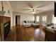 Inviting living room with a fireplace, hardwood floors, and plenty of natural light at 770 Prickett Rd, Douglasville, GA 30134