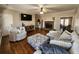 Cozy living room featuring a fireplace, hardwood floors, and comfortable seating at 770 Prickett Rd, Douglasville, GA 30134