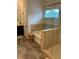 Bathroom with a bathtub, glass shower, and dark wood cabinets at 140 Craines Vw, Covington, GA 30014