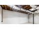 Unfinished basement with white walls, visible ductwork, and concrete floors at 2466 Sharondale Ne Dr, Atlanta, GA 30305