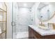 Bathroom showcasing a glass shower, modern vanity, and gold fixtures at 2466 Sharondale Ne Dr, Atlanta, GA 30305