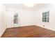 Spacious bedroom with hardwood floors and access to the outdoor patio at 2466 Sharondale Ne Dr, Atlanta, GA 30305