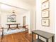 Elegant dining room with hardwood floors, decorative chandelier, and a large painting at 2466 Sharondale Ne Dr, Atlanta, GA 30305