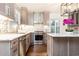 This kitchen shows off marble countertops, stainless steel appliances, and a subway tile backsplash at 2466 Sharondale Ne Dr, Atlanta, GA 30305