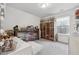 Spacious walk-in closet with custom shelving and organizers, perfect for showcasing shoes and accessories at 43 N Auburn Landing Pl, Auburn, GA 30011