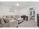 Cozy living room featuring neutral decor, comfortable seating, and stylish accents, perfect for relaxation at 43 N Auburn Landing Pl, Auburn, GA 30011