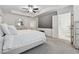 Elegant main bedroom features a spacious layout, modern decor, and an ensuite bathroom for added privacy at 43 N Auburn Landing Pl, Auburn, GA 30011