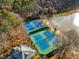 Aerial view of the community tennis courts and lake at 9480 Hillside Dr, Roswell, GA 30076