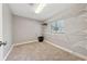 Walk-in closet with installed shelving and natural light from a window at 9480 Hillside Dr, Roswell, GA 30076