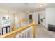 Bright foyer showcasing an elegant chandelier, staircase with wooden railings, and a large window above the front door at 271 Double Gate Ct, Sugar Hill, GA 30518