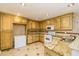 Bright kitchen with granite countertops, tiled backsplash, and updated white appliances at 271 Double Gate Ct, Sugar Hill, GA 30518