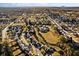 Aerial view of a residential area highlighting autumn foliage, local roads, and community layout at 2773 Saddle Horn Place Southwest Pl, Snellville, GA 30039