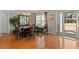 Elegant dining room featuring hardwood floors, chandelier, and large windows at 2773 Saddle Horn Place Southwest Pl, Snellville, GA 30039