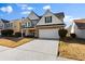 Charming two-story home with a two car garage and traditional stone accents at 2773 Saddle Horn Place Southwest Pl, Snellville, GA 30039