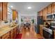 Well-lit kitchen with stainless steel appliances and beautiful granite countertops at 2773 Saddle Horn Place Southwest Pl, Snellville, GA 30039