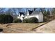 Charming one-story home with gabled roof and front yard awaiting landscaping touch at 1385 Womack Ave, Atlanta, GA 30344