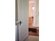 Hallway featuring hardwood floors and view into adjacent room at 1385 Womack Ave, Atlanta, GA 30344