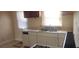 Kitchen with a double sink and base cabinets at 1385 Womack Ave, Atlanta, GA 30344