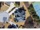 Aerial view of roofline and landscaping of home including backyard, driveway and other features at 2740 Heritage Bend Ct, Grayson, GA 30017