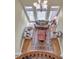 View of living room from the staircase with an ornate rug, and decorative furniture at 2740 Heritage Bend Ct, Grayson, GA 30017