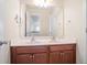 Bathroom featuring double sink vanity with cabinets at 1200 St James Pl, Loganville, GA 30052