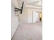 Carpeted bedroom featuring ceiling fan and tv on the wall at 1200 St James Pl, Loganville, GA 30052