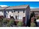 Exterior view of a townhome with a deck and landscaped backyard at 3185 Quinn Pl, Atlanta, GA 30341