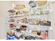 Organized pantry with shelving for ample storage at 3185 Quinn Pl, Atlanta, GA 30341