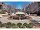 A community park featuring benches, pavers and landscaping, nestled among modern townhomes at 3185 Quinn Pl, Atlanta, GA 30341