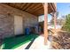 Brick patio area with green turf featuring a bicycle and an air conditioner at 3185 Quinn Pl, Atlanta, GA 30341