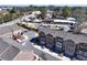 A view of modern townhomes with brick facades, garages, and landscaped surroundings at 3185 Quinn Pl, Atlanta, GA 30341