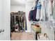 Spacious walk-in closet featuring ample shelving and clothing storage at 3185 Quinn Pl, Atlanta, GA 30341