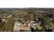 Aerial view of 541 Buckingham showcasing home and neighborhood surrounded by mature trees and lush landscaping at 541 Buckingham Cir, Marietta, GA 30066