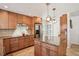 Bright kitchen with granite countertops, an island, and stainless steel appliances at 541 Buckingham Cir, Marietta, GA 30066