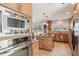 Open concept kitchen with stainless steel appliances and granite countertops at 541 Buckingham Cir, Marietta, GA 30066