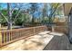 Spacious wooden deck with railing, ideal for outdoor entertaining and relaxation at 944 Woodland Se Ave, Atlanta, GA 30316