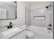 This bathroom features a shower/tub combo with modern black hardware at 944 Woodland Se Ave, Atlanta, GA 30316