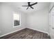 This bedroom features a closet and a window at 944 Woodland Se Ave, Atlanta, GA 30316