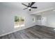 Living area with hardwood floors that open to a deck and dining room at 944 Woodland Se Ave, Atlanta, GA 30316